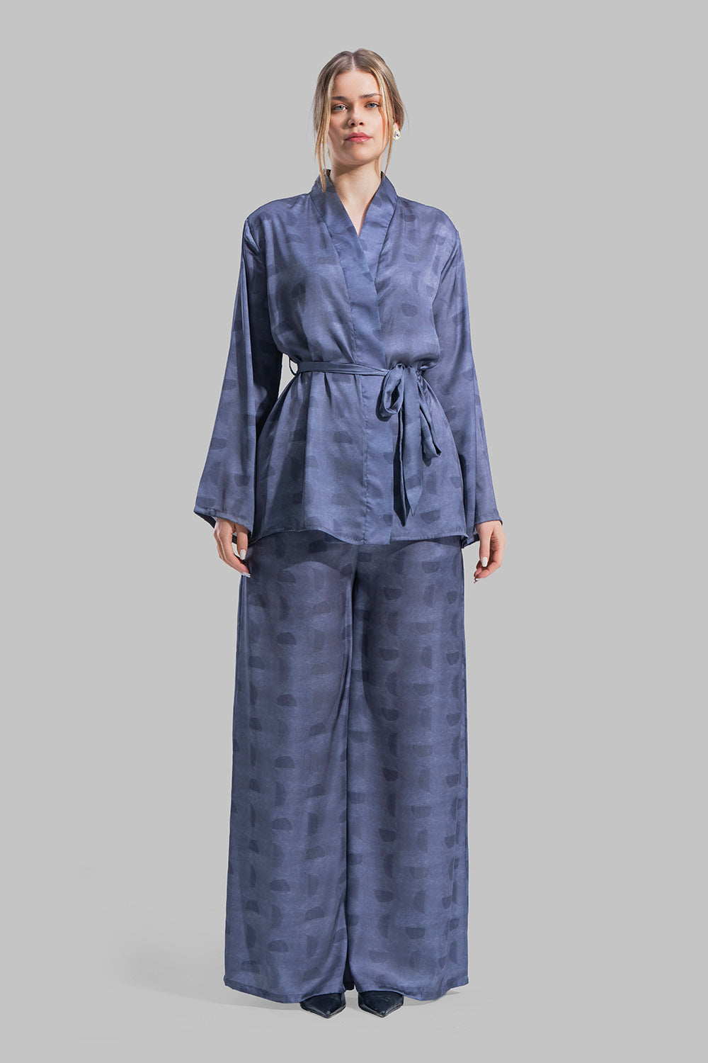 Long sleeve Cardigan with a wrap-style front.