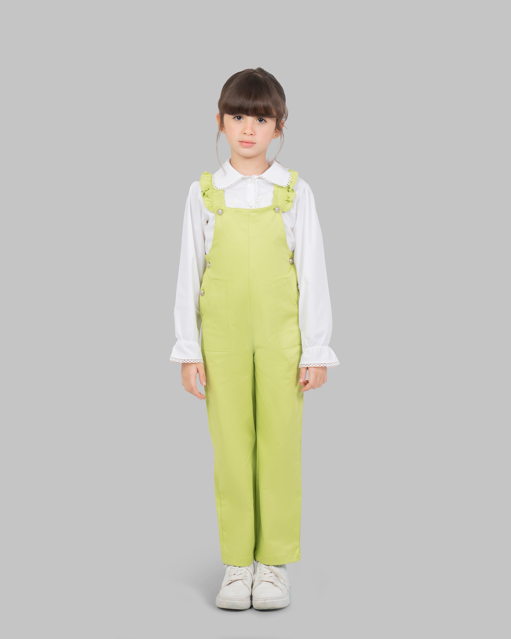 jumpsuit in flashy colors with adjustable shoulder straps and ruffle detailing.