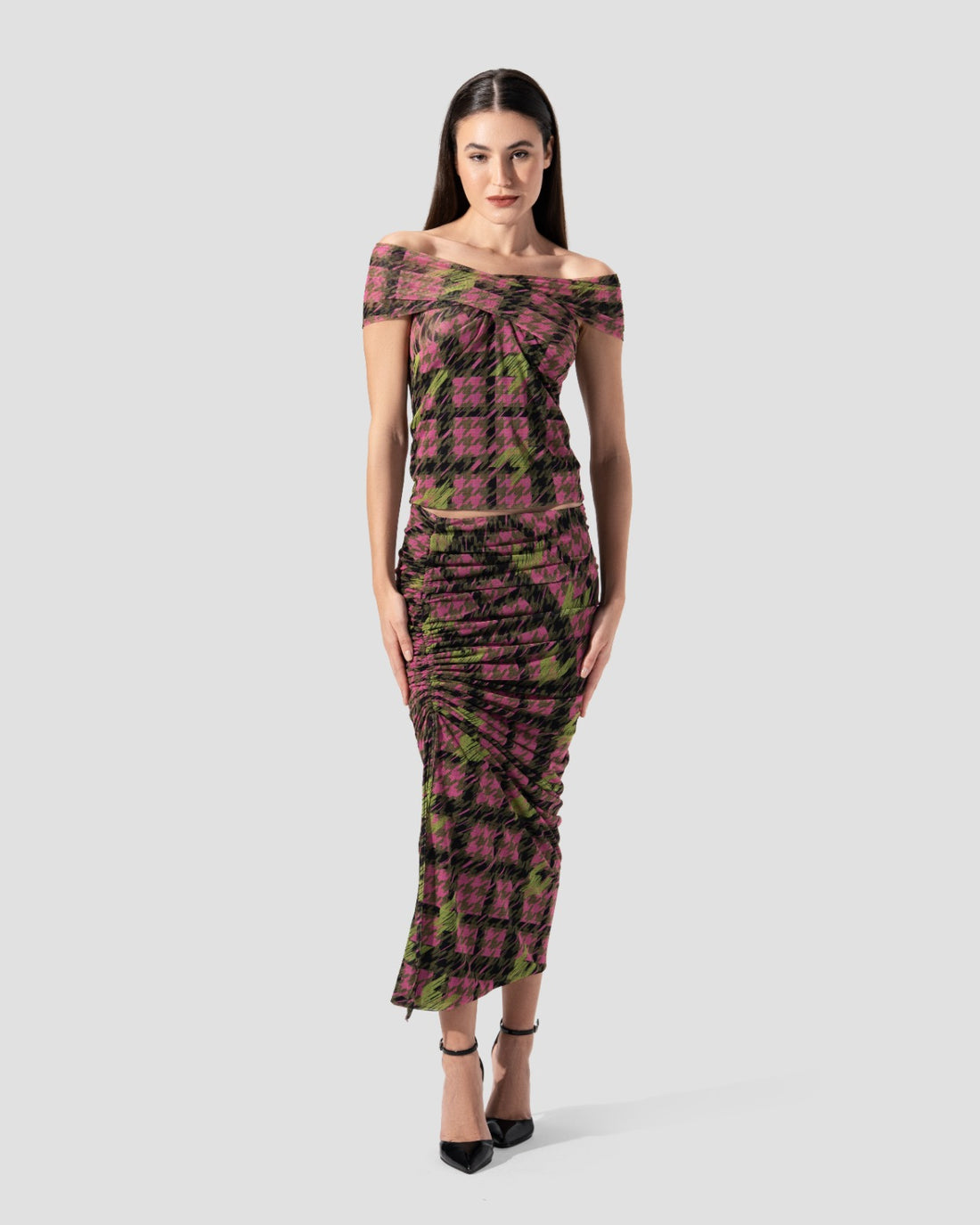 Sleeveless top with cross-over draped front