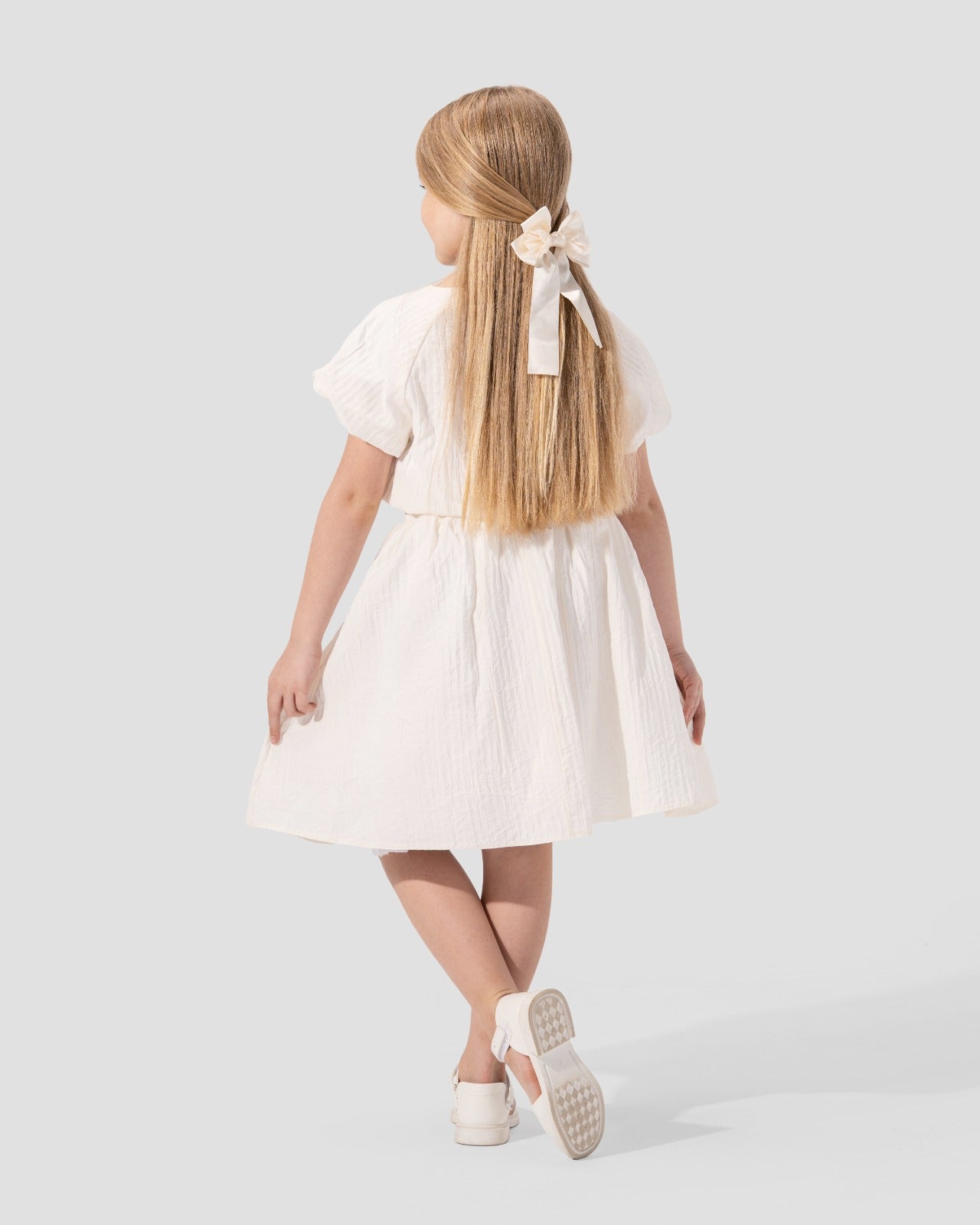 High-waist midi skirt with an elastic waistband and a gathered design