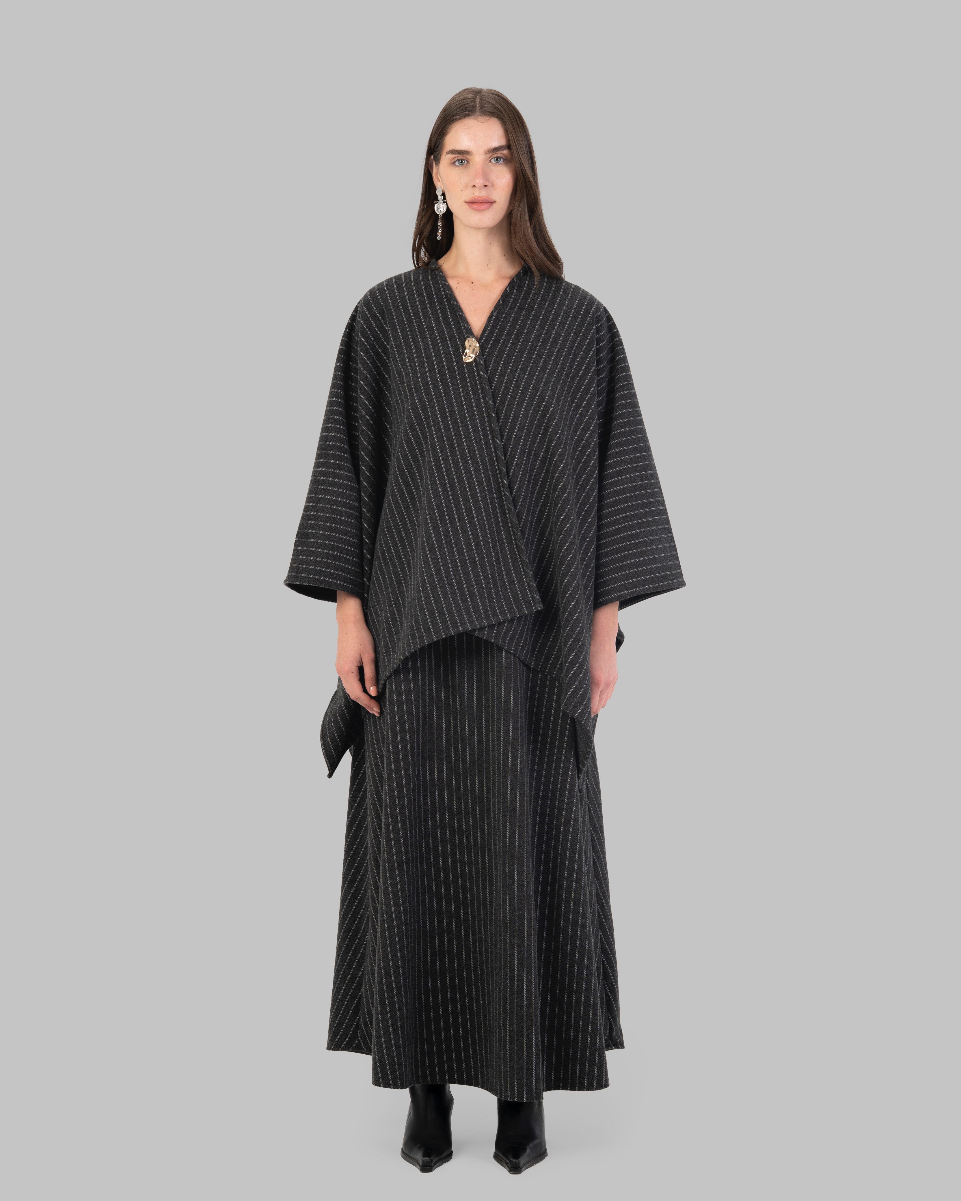 pinstripe poncho with a V-neck and an asymmetric hem.
