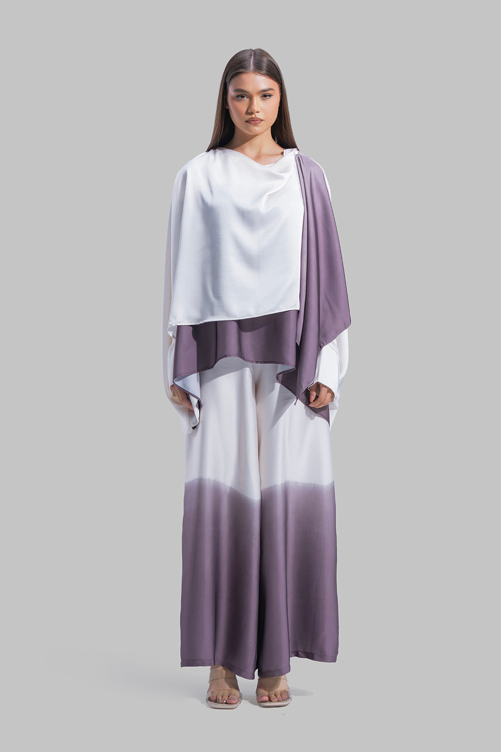 Draped asymmetrical blouse with a side-split design.