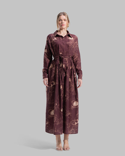 Floral print midi shirt dress with a matching tie belt at the waist.