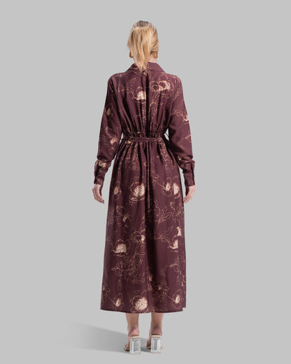 Floral print midi shirt dress with a matching tie belt at the waist.