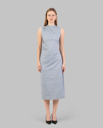 fitted dress with a pink and black houndstooth pattern.