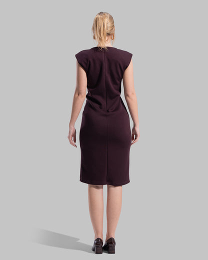 Sleeveless midi dress featuring a round neckline and front draped knot detail.