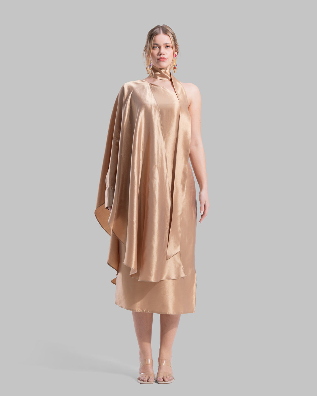 One-shoulder satin midi dress featuring a draped cape overlay and side slit