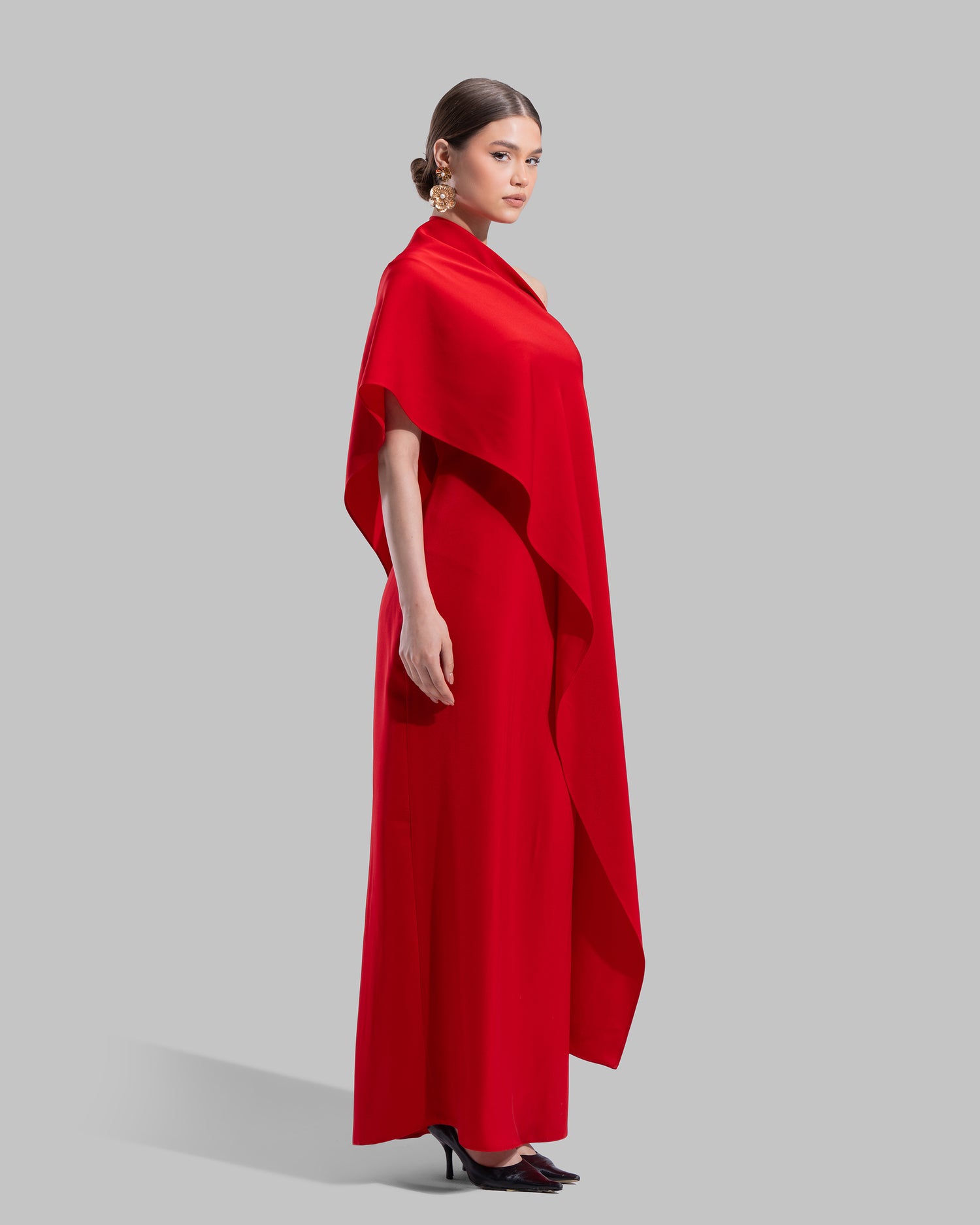 Draped asymmetrical neckline satin maxi dress with a fluid oversized silhouette.
