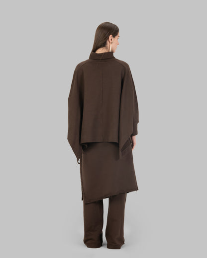 Wide-leg pants with an attached wrap-over skirt panel.