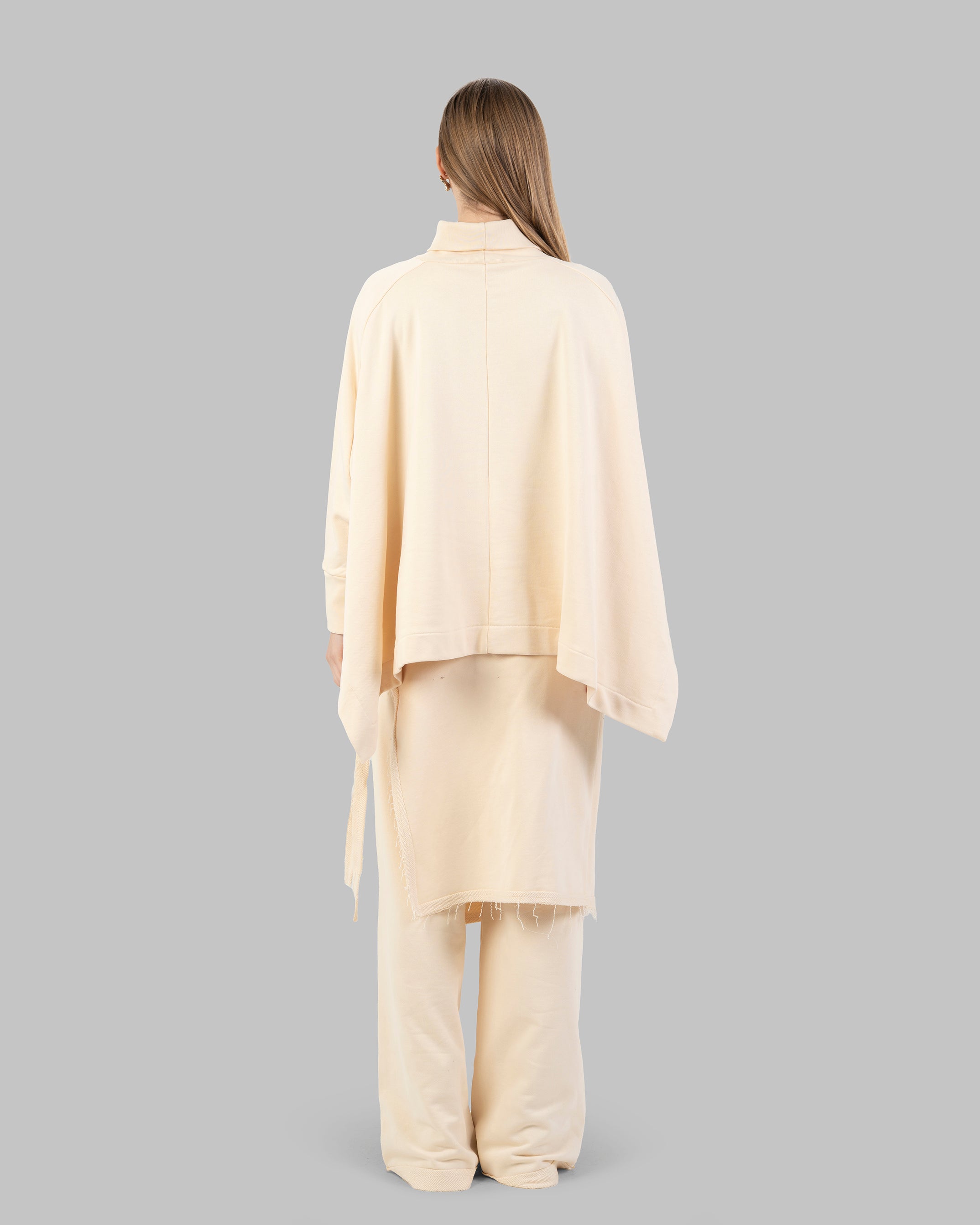 Wide-leg pants with an attached wrap-over skirt panel.