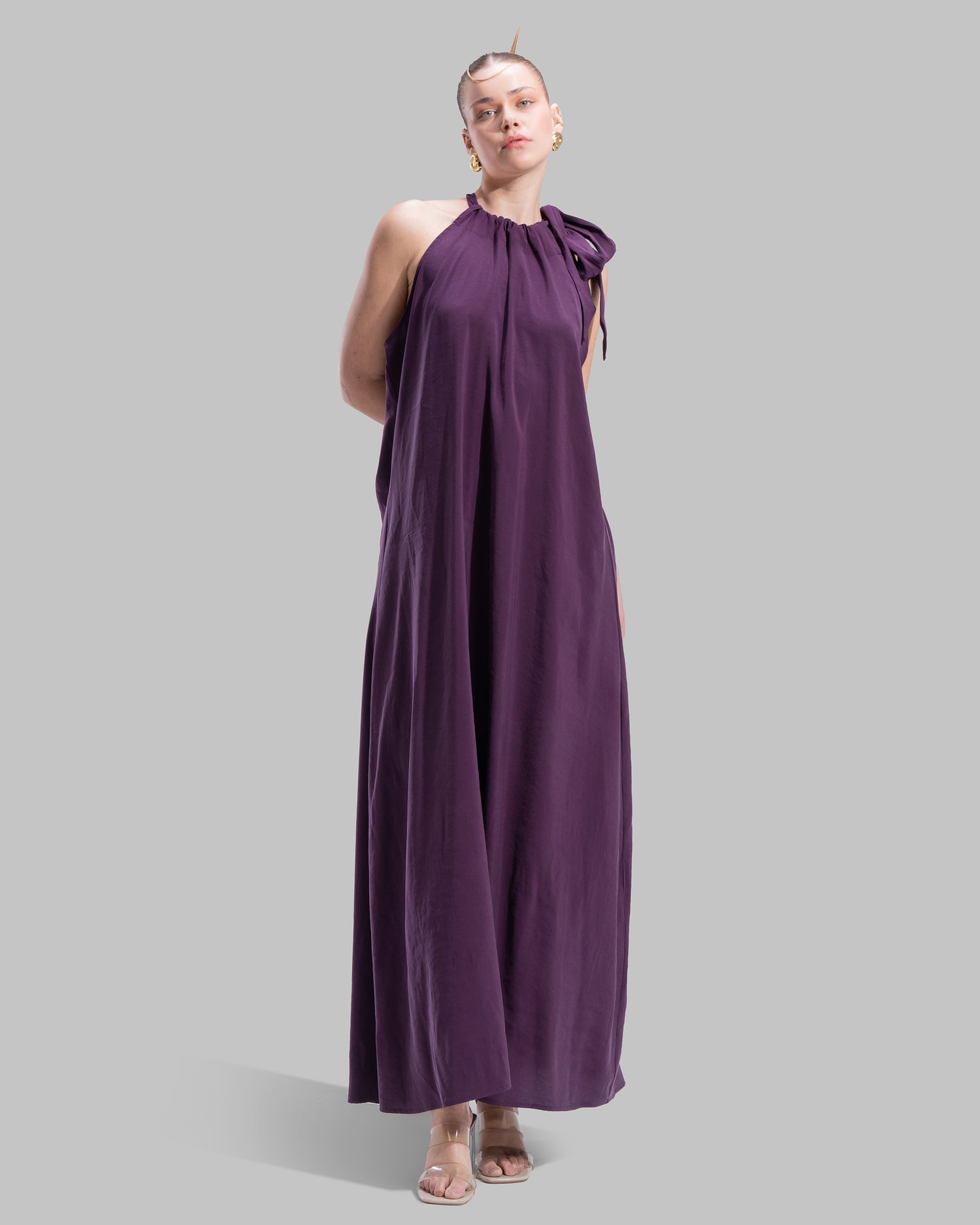 Long dress with a halter neckline.
