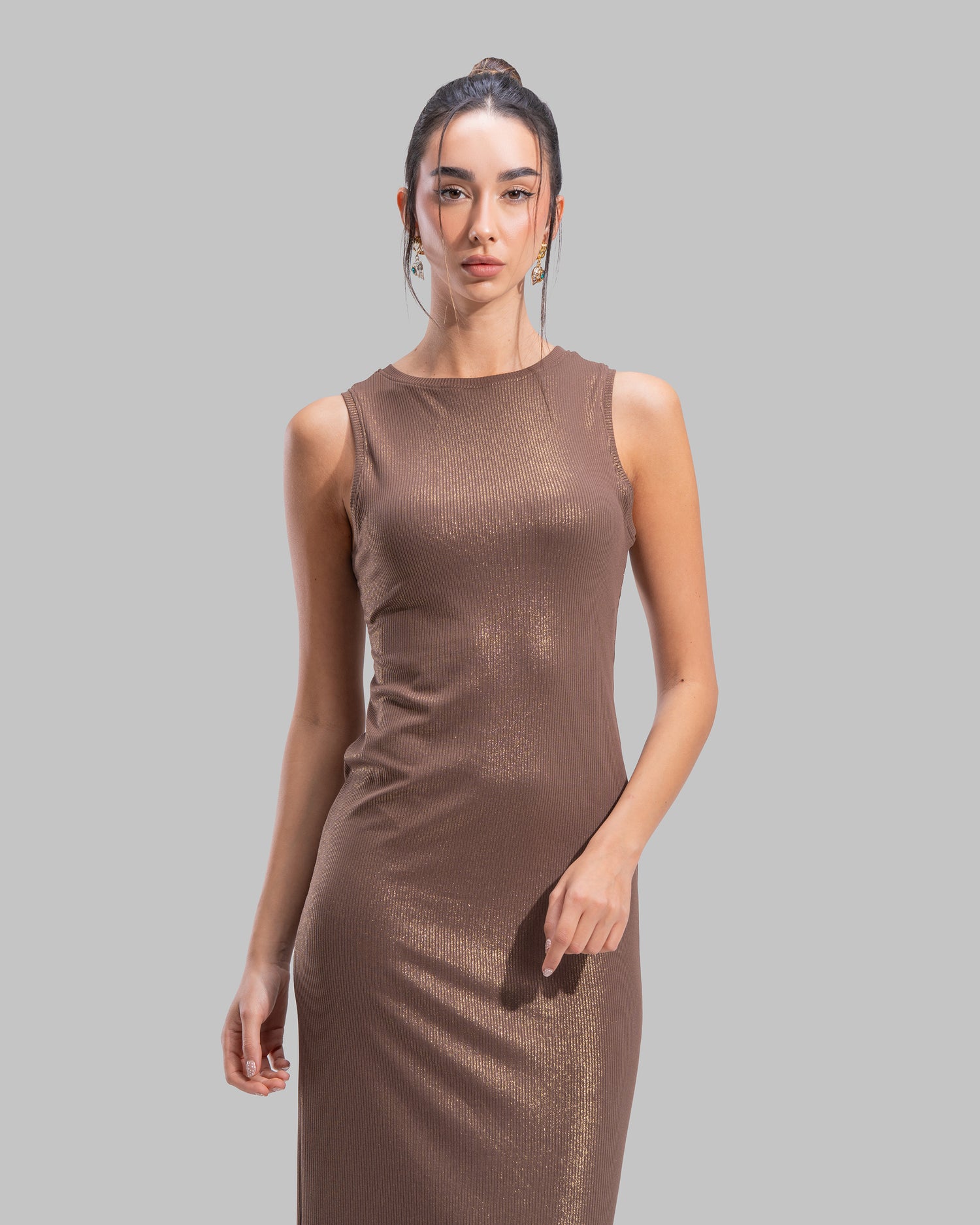 Sleeveless ribbed maxi dress with a round neckline and a tight-fit silhouette.