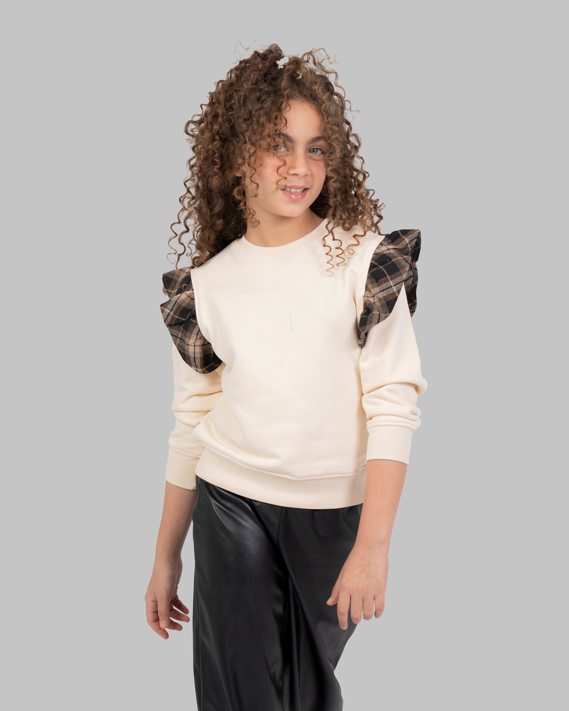 بنطال جلدي مستقيم بخصر مطاطي.