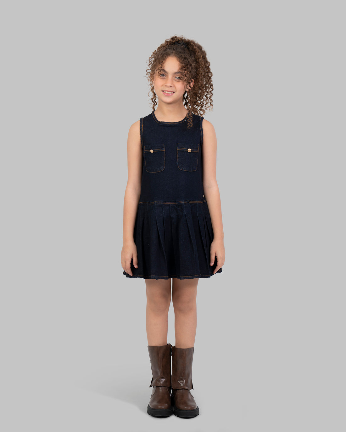 Denim Pleated Dress, Sleeveless mini dress in a dark wash denim.