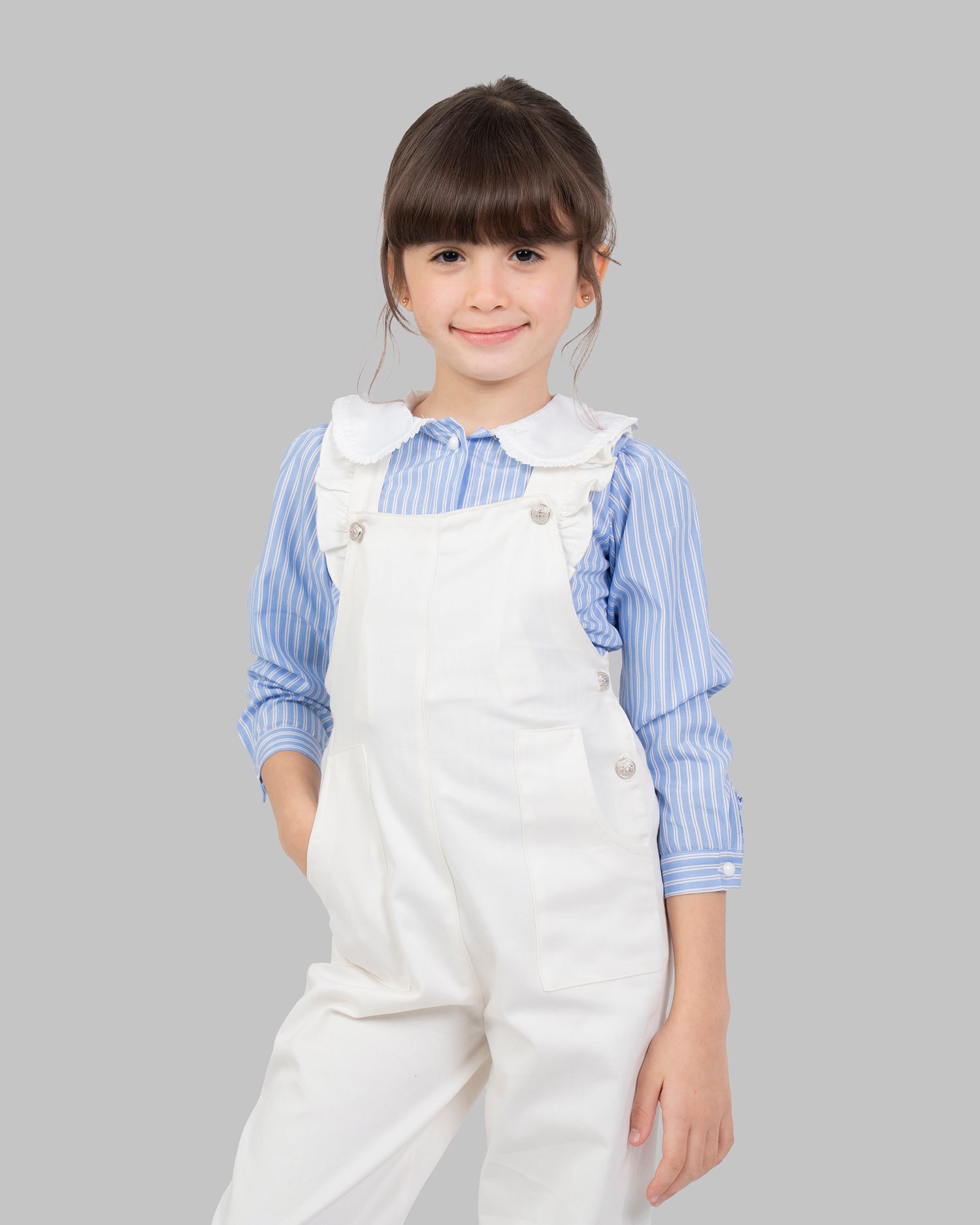 jumpsuit in flashy colors with adjustable shoulder straps and ruffle detailing.