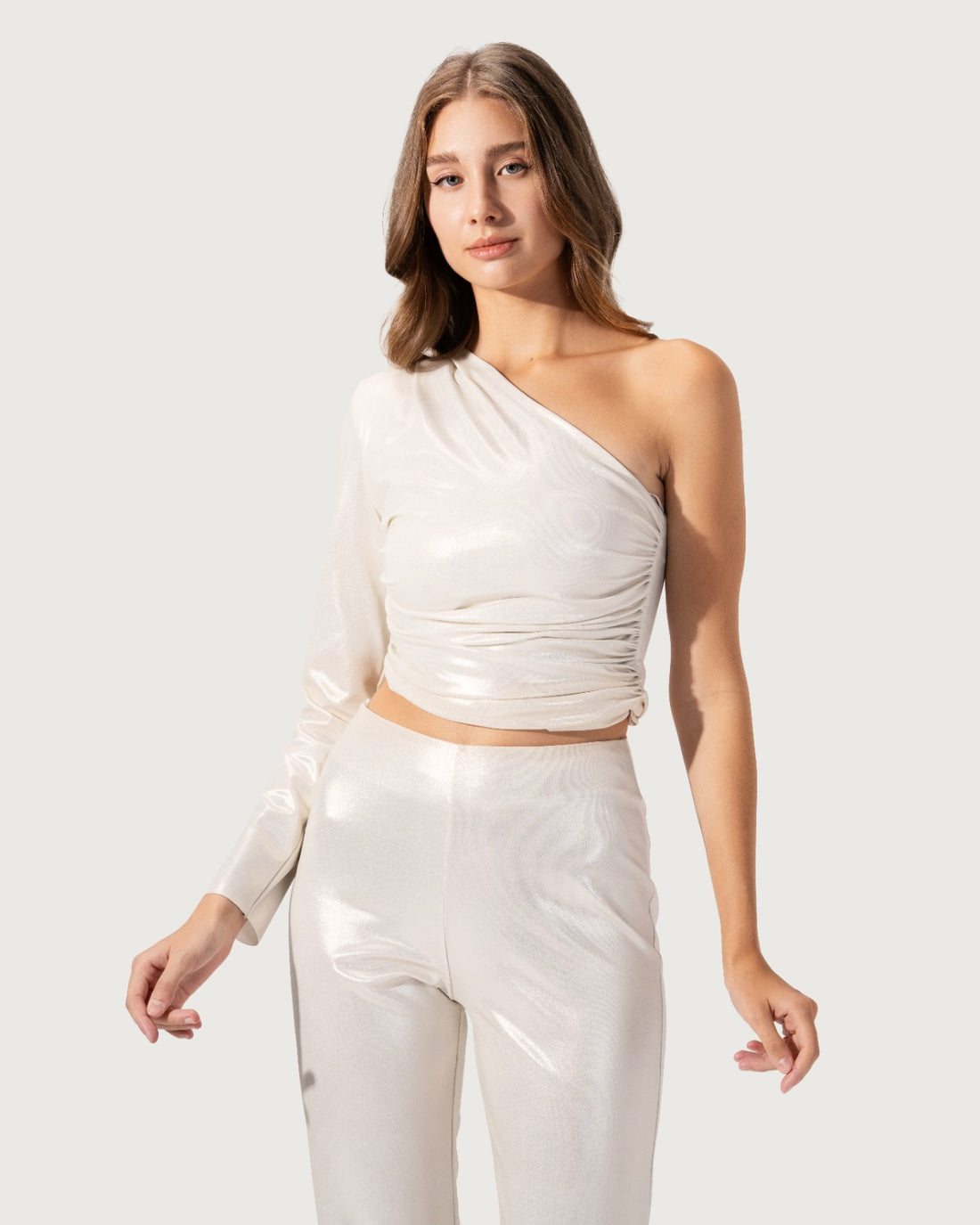 Sleeveless top with cross-over draped front