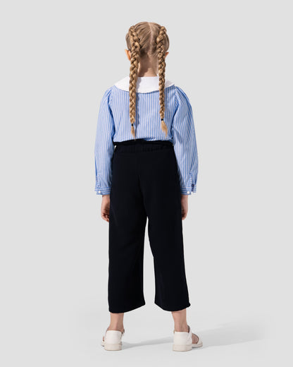 Wide-leg culotte trousers in navy blue with a high waist and side tie detail.