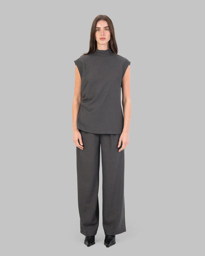 High-Waist Pleated Trousers.