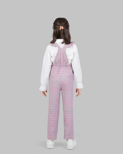 jumpsuit with houndstooth print adjustable shoulder straps and ruffle detailing.